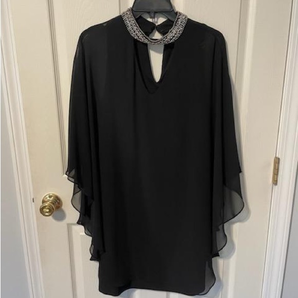 XSCAPE - Picture 1 of 3